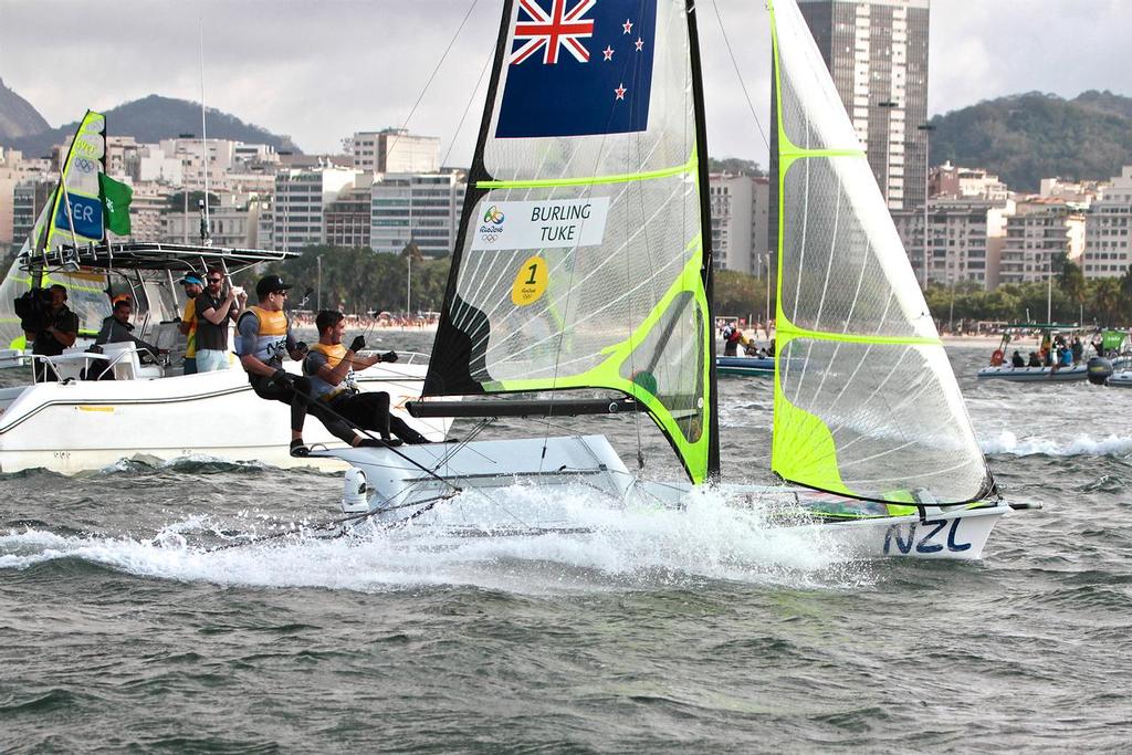 Burling and Tuke head for their fans on the beach to celebrate their Gold Medal win - 49er Medal race- 2016 Sailing Olympics © Richard Gladwell www.photosport.co.nz